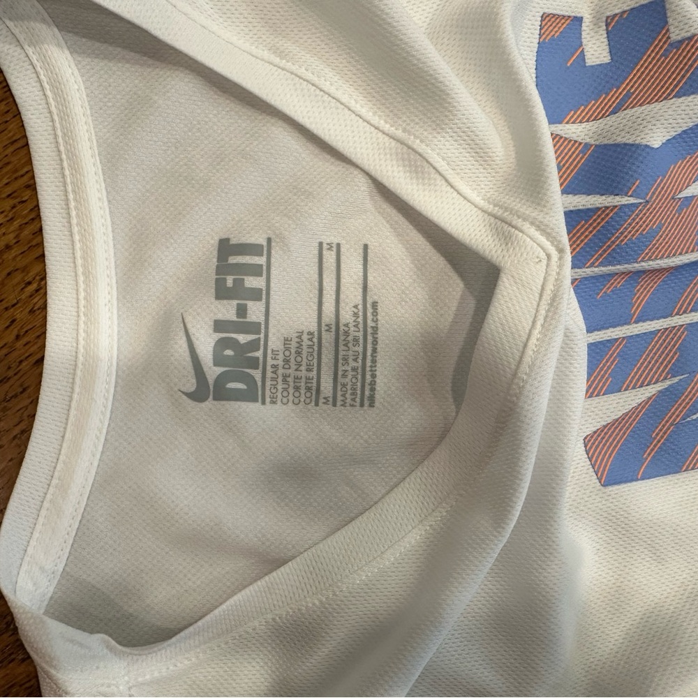 Women’s Nike White Dri-FIT Tee with Blue and Red Graphic Size Medium